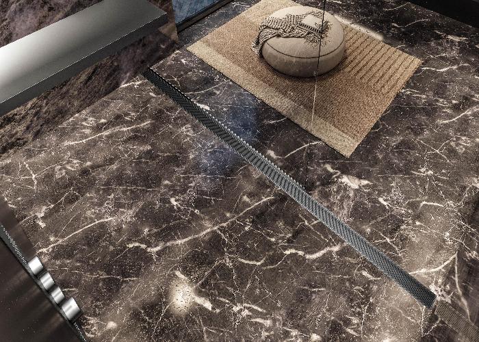 QM Drain Lagos Wedgewire Banner, showcasing the sleek stainless-steel linear drain with a precision wedge-wire grate design. The banner highlights high-flow drainage performance, seamless tile integration, and modern aesthetics, ideal for luxury bathroom and shower floor installations.