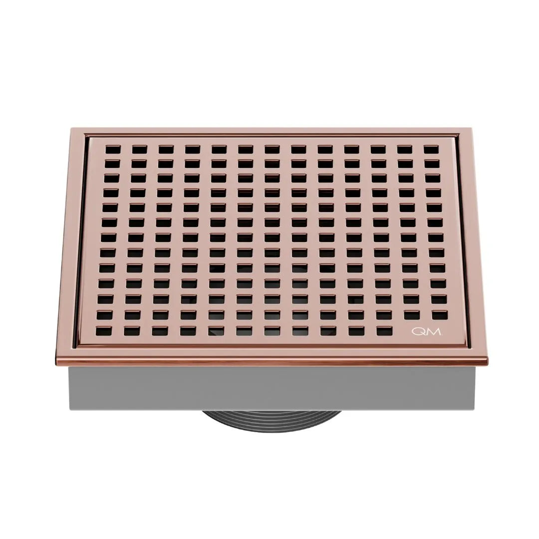 QM Drain Lagos Mira Square Drain 5 3/4 in Bronze finish, featuring a sleek stainless-steel square design with a fine perforated grate. This drain offers efficient water drainage, seamless integration into modern shower floors, and a contemporary aesthetic for luxury bathroom installations.