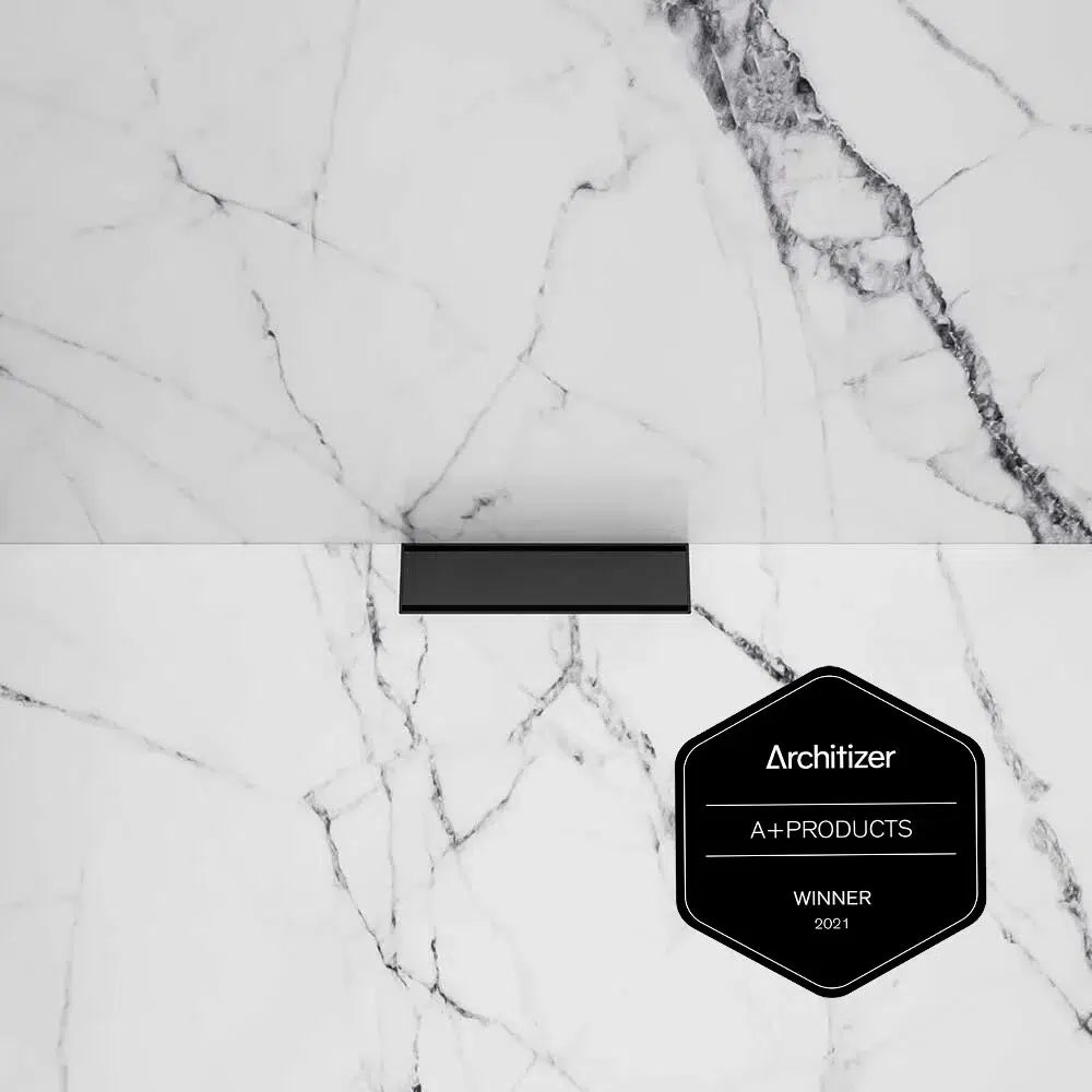 QM Drain Supreme 2021 Vista Close-up in Black finish, showcasing a detailed view of the sleek stainless-steel linear drain with precision perforated grate. This drain offers efficient water drainage, a modern aesthetic, and seamless integration into luxury bathroom and shower installations.