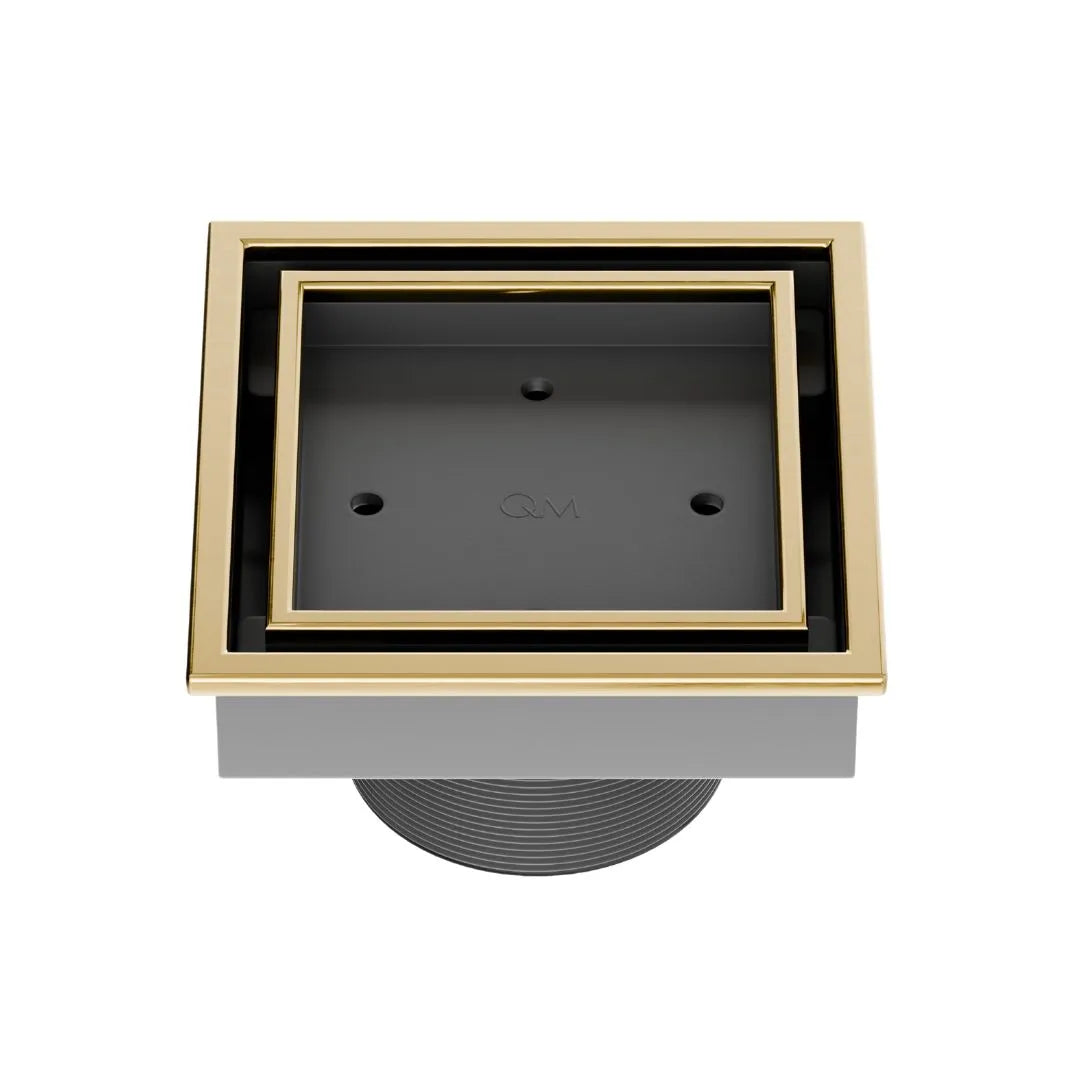 QM Drain Lagos Veil (Tile-In) Square Drain 4" in Gold finish, featuring a sleek stainless-steel channel with a concealed grate design for seamless tile integration. This drain offers efficient water drainage and a modern minimalist aesthetic, perfect for luxury shower and bathroom installations.