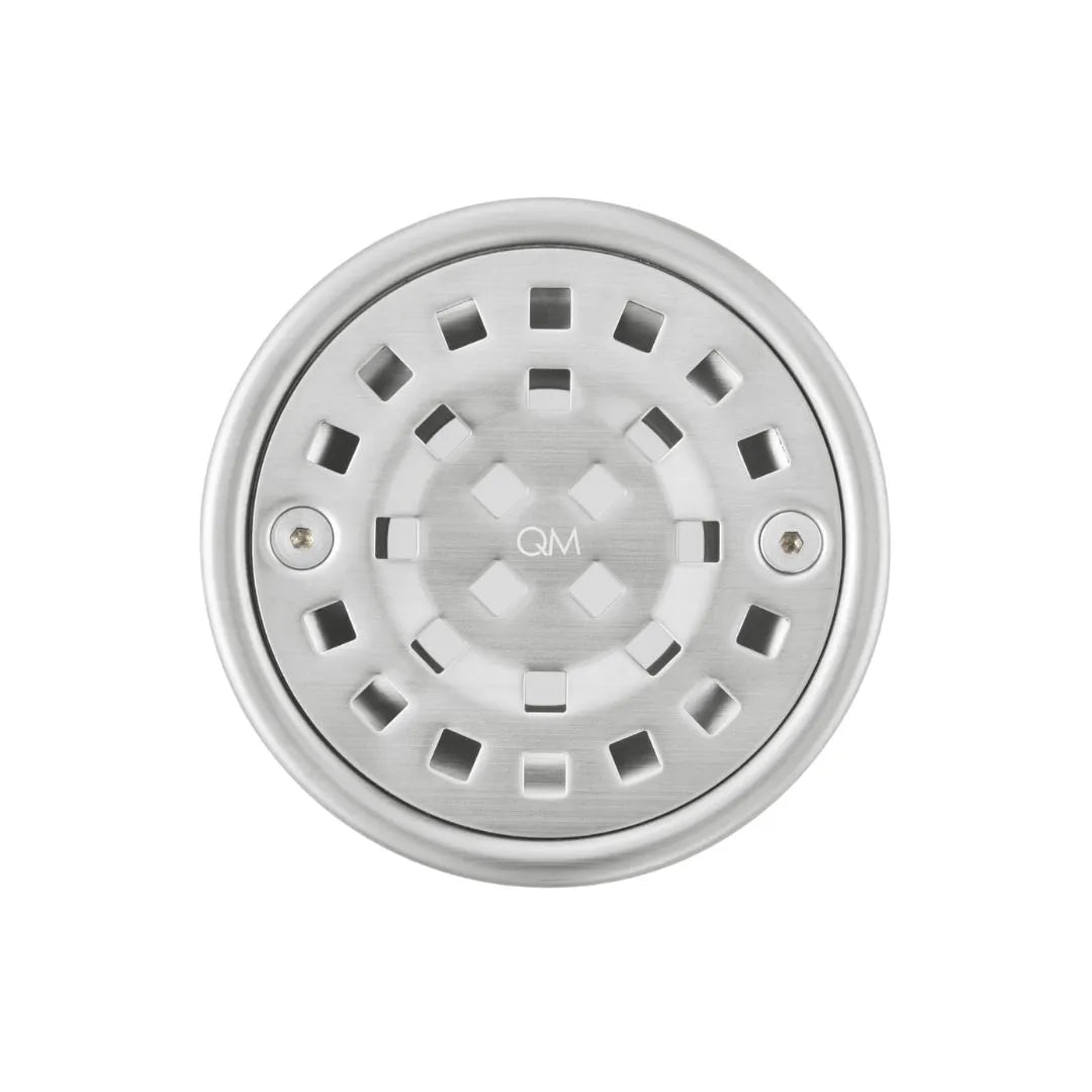 Front view of Bay Round Center Drain by QM Drain. Stainless steel round grate with center outlet shown in detail for a clean, functional shower drain solution.