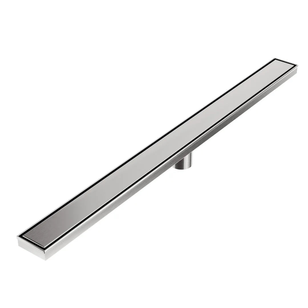 Modern bathroom scene featuring the QM Drain Bay Linear Drain 2-in-1 installed in a stone-tiled shower floor, showcasing its dual-function drain and trap design, sleek stainless-steel profile, and rapid water removal for premium residential or commercial spaces