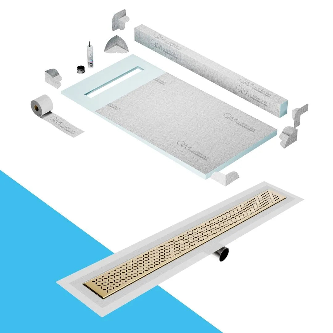 QM Drain Curb Shower Pan with Delmar Lotus Side Outlet Linear Drain, stainless-steel decorative floral-pattern grate, ensuring efficient drainage, available in Satin, Gold, Bronze, Polished, and Black finishes.