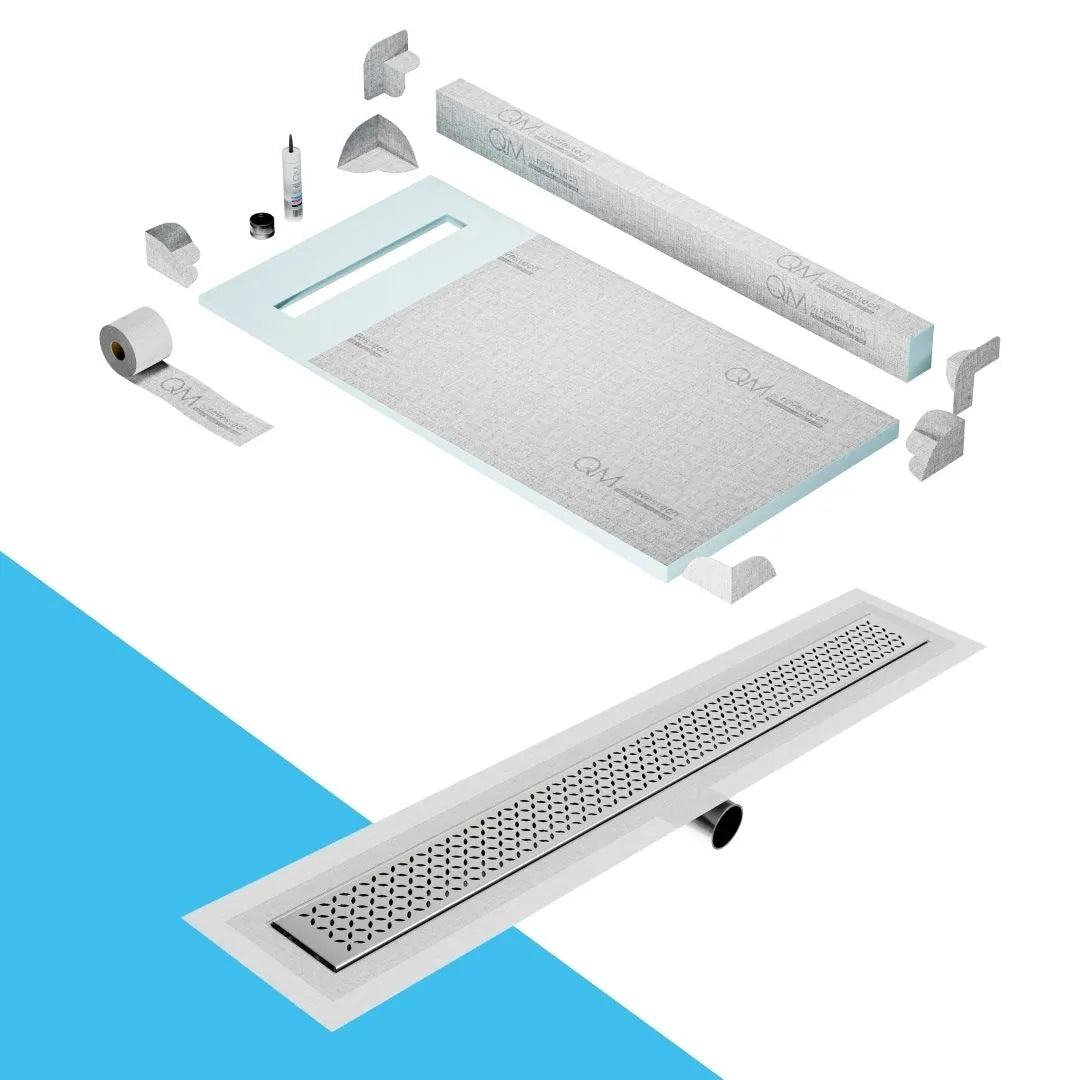QM Drain Curb Shower Pan with Delmar Delta Side Outlet Linear Drain, featuring stainless-steel grate with modern square perforations, efficient drainage, available in Satin, Gold, Bronze, Polished, and Black finishes.