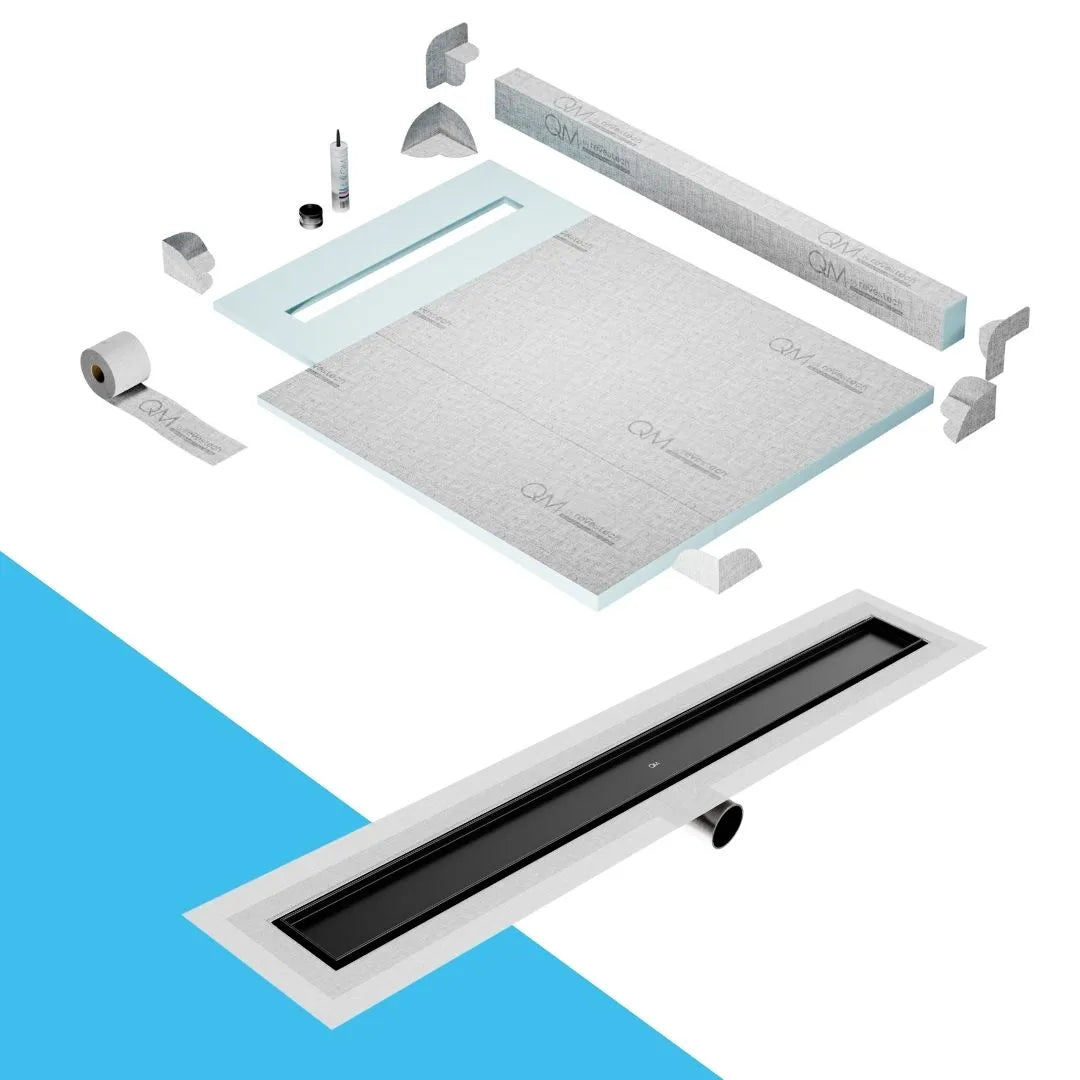 QM Drain Curb Shower Pan with Delmar Mist Tile-In Side Outlet Linear Drain, stainless-steel grate allowing seamless tile integration, 'mist' perforations, modern aesthetics, available in Satin, Gold, Bronze, Polished, and Black finishes.