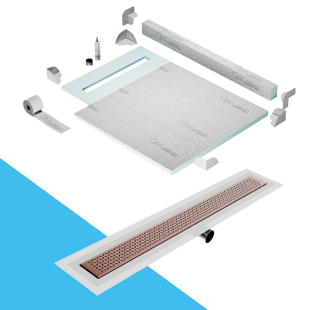 QM Drain Curb Shower Pan with Delmar Lotus Side Outlet Linear Drain, stainless-steel decorative floral-pattern grate, ensuring efficient drainage, available in Satin, Gold, Bronze, Polished, and Black finishes.