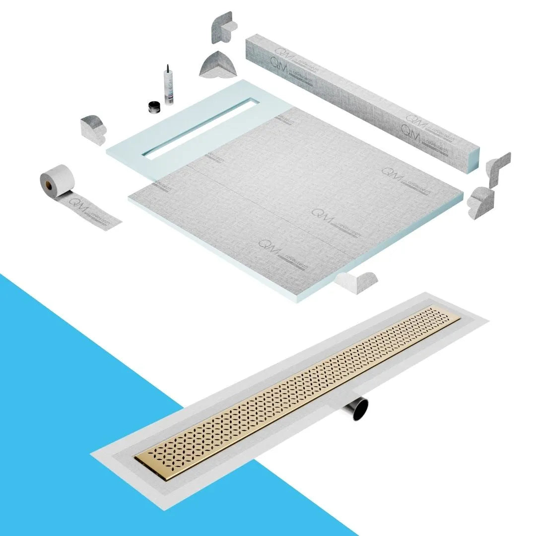 QM Drain Curb Shower Pan with Delmar Lotus Side Outlet Linear Drain, stainless-steel decorative floral-pattern grate, ensuring efficient drainage, available in Satin, Gold, Bronze, Polished, and Black finishes.