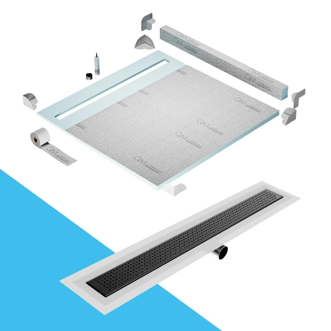 QM Drain Curb Shower Pan with Delmar Lotus Side Outlet Linear Drain, stainless-steel decorative floral-pattern grate, ensuring efficient drainage, available in Satin, Gold, Bronze, Polished, and Black finishes.