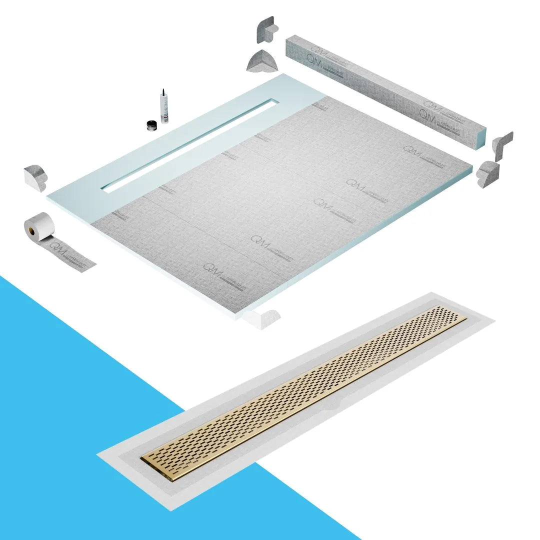 QM Drain Curb Shower Pan with Delmar Delta Flange Edge Linear Drain, stainless-steel grate featuring modern square perforations, efficient drainage with integrated flange, available in Gold, Bronze, Polished, and Black finishes.