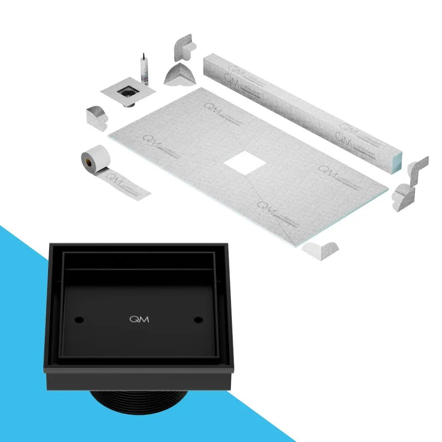 QM Drain Curb Shower Pan with Delmar Mist Tile-In Center Square Drain, allowing seamless tile integration into its stainless-steel 'mist' perforated grate, ideal for minimalist bathroom designs, in Satin, Gold, Bronze, Polished, and Black.