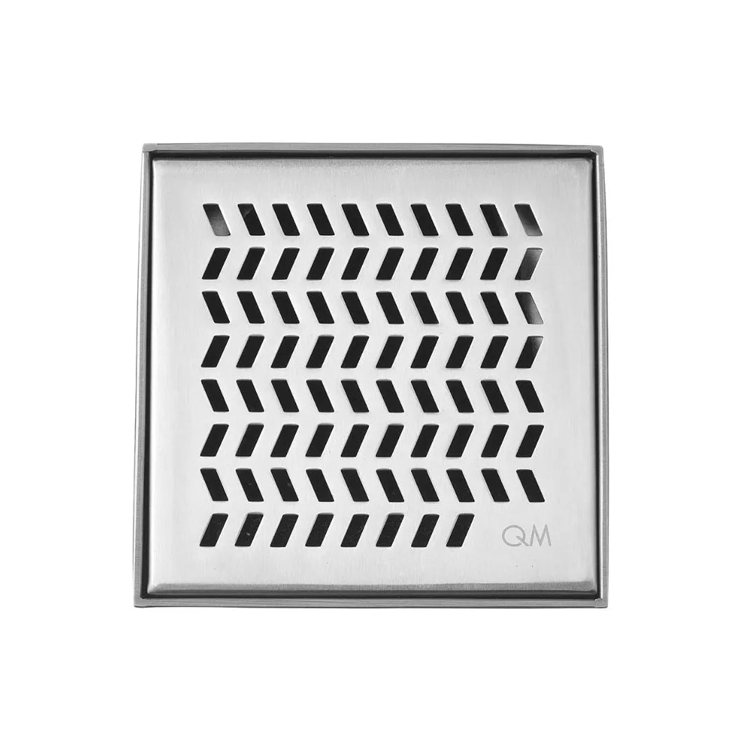 QM Drain Delmar Nami Square Drain 2-inch, featuring a sleek stainless-steel channel with a modern perforated grate design. This drain ensures efficient water drainage, seamless tile integration, and a contemporary aesthetic, ideal for luxury shower and bathroom floor installations.