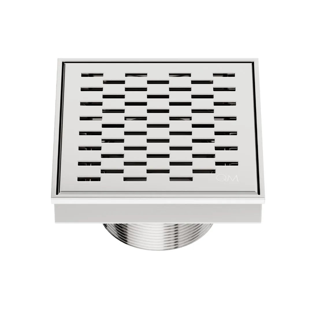 QM Drain Delmar Delta Square Drain in Polished finish, featuring a sleek stainless-steel square-pattern grate. This drain ensures efficient water drainage and seamless tile integration, offering a sophisticated and modern aesthetic for luxury shower and bathroom floor installations