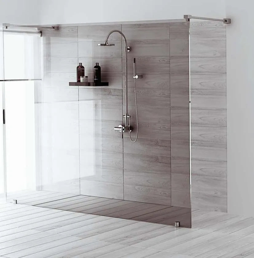 QM Drain Invisible Shower Tray 1 installed in a sophisticated bathroom setting, seamlessly integrated with the floor for a clean, modern look. The tray offers efficient water drainage and a minimalist design, enhancing the aesthetic and functionality of luxury shower and bathroom floor installations.