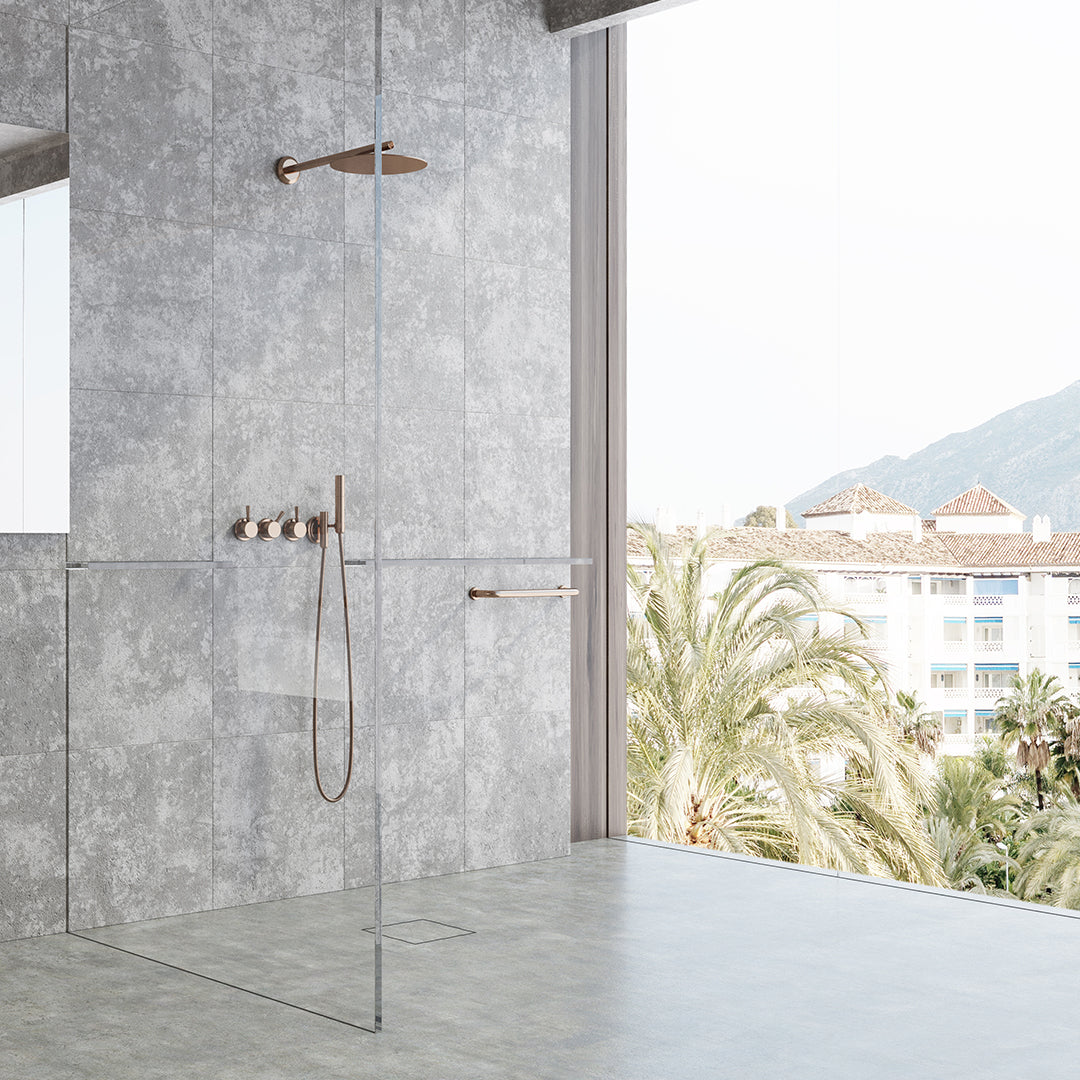 Modern spa shower area featuring the QM Drain Invisible Square Tile-In Drain—4″×4″ concealed stainless-steel grate integrated with mosaic floor tiles, showcasing seamless waterproofing flange and high-flow drainage for a luxury wellness environment.