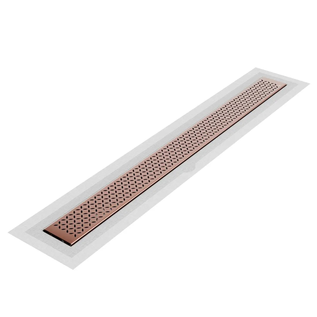 QM Drain Lotus Delmar Standard Length Flange Edge Linear Drain in Bronze finish, featuring a sleek stainless-steel channel with an integrated flange edge. This drain ensures seamless tile integration and efficient water drainage, adding a luxurious touch to modern bathroom floors.