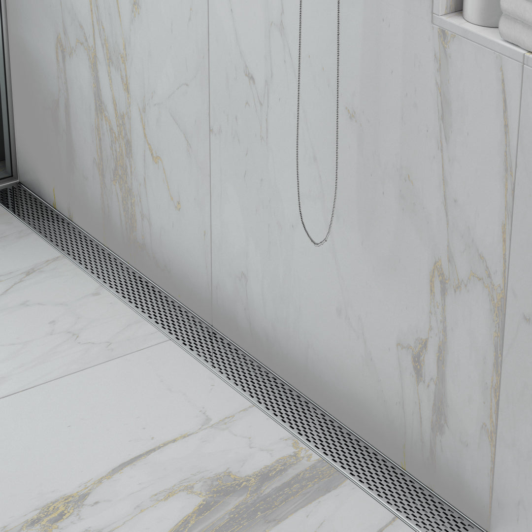 Modern bathroom showcasing the QM Drain Delta Linear Drain in Polished finish—2″ outlet stainless-steel channel drain with sleek grate design, engineered for high-flow performance, secure waterproofing, and seamless integration in contemporary shower floors.