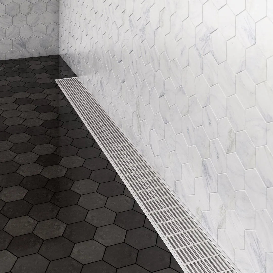 Wedgewire Delmar Standard-Length Flange-Edge Linear Drain in Satin finish—stainless-steel channel with integrated flange edge and corrosion-resistant wedge-wire grate, designed for secure waterproof installation and efficient, high-capacity drainage in luxury shower floors.
