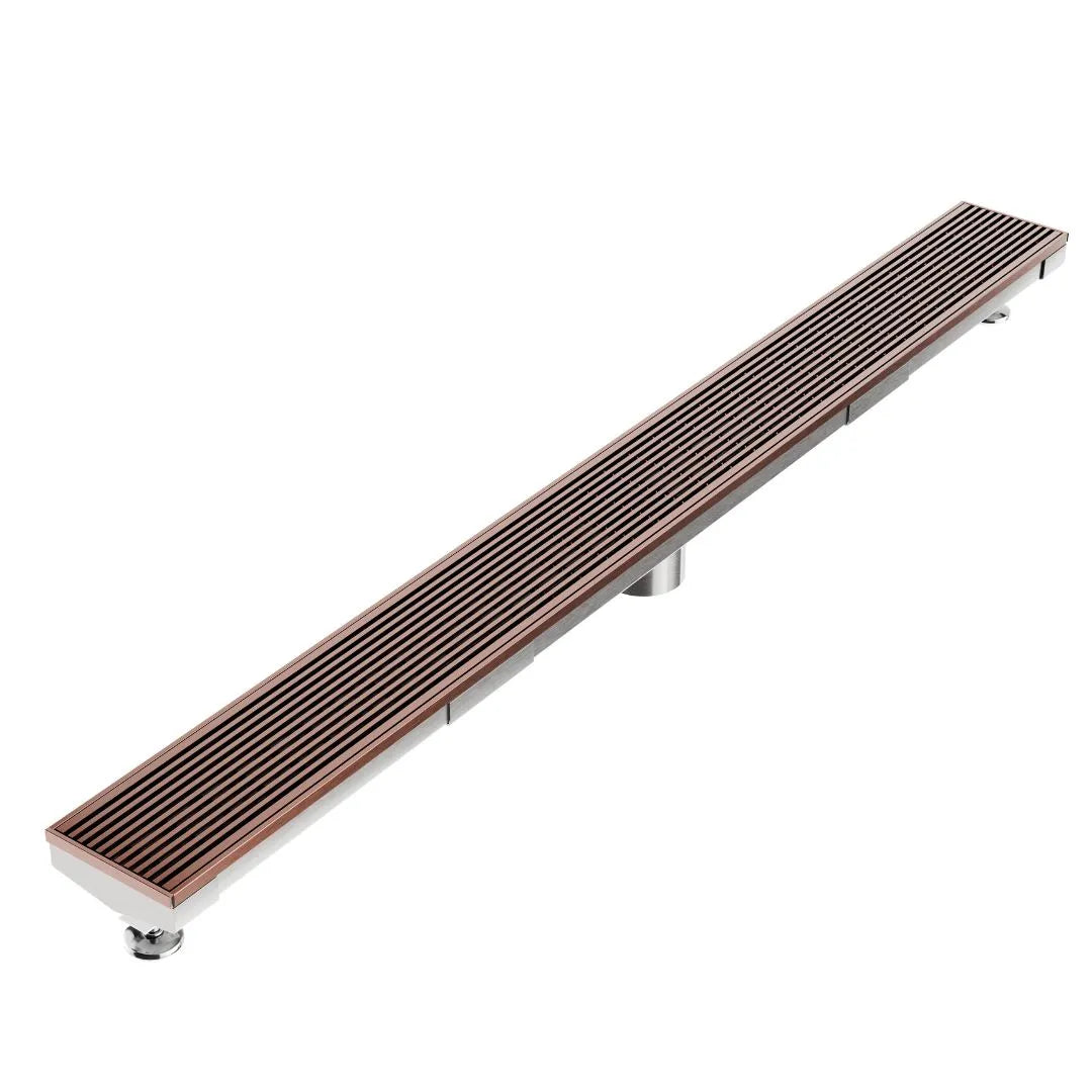 Wedgewire Delmar Adjustable Kit Linear Drain in Bronze finish with 2″ outlet – stainless-steel adjustable-length channel drain kit featuring a corrosion-resistant wedge-wire grate, integrated 2″ outlet, and on-site adjustable frame for precise fit and efficient water evacuation in luxury showers.