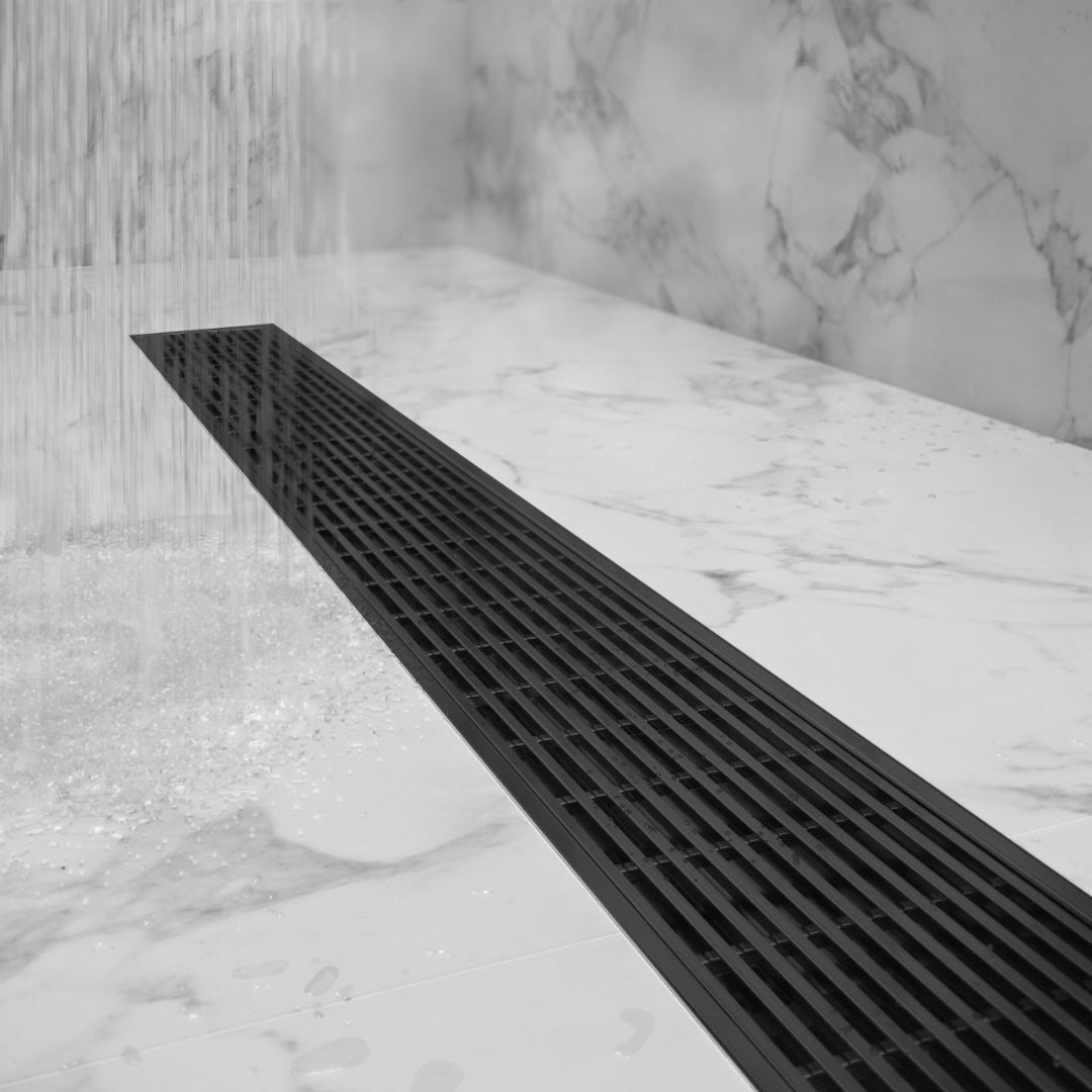 Wedgewire Delmar Standard-Length Plain-Edge Linear Drain in Satin finish—sleek stainless-steel channel flush with tile, featuring a smooth plain edge and corrosion-resistant wedge-wire grate for rapid, clog-resistant drainage in modern shower installations.