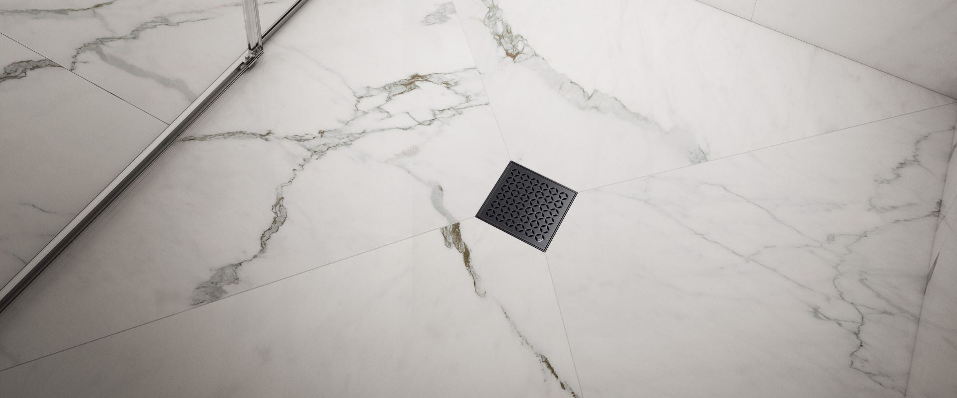 Banner showing Lotus Center Drains installed on a bathroom floor, highlighting premium stainless steel construction, square modern design, and durable performance by QM Drain.