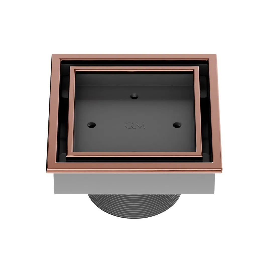 QM Drain Lagos Veil (Tile-In) Square Drain 4" in Bronze finish, featuring a sleek stainless-steel channel with a concealed grate design for seamless tile integration. This drain offers efficient water drainage and a modern minimalist aesthetic, perfect for luxury shower and bathroom installations.