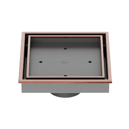 QM Drain Lagos Veil (Tile-In) Square Drain 5¾” in Bronze finish, featuring a sleek stainless-steel channel with a concealed grate design. This drain allows seamless tile integration, providing efficient water drainage while maintaining a modern, minimalist aesthetic for high-end shower and bathroom installations.