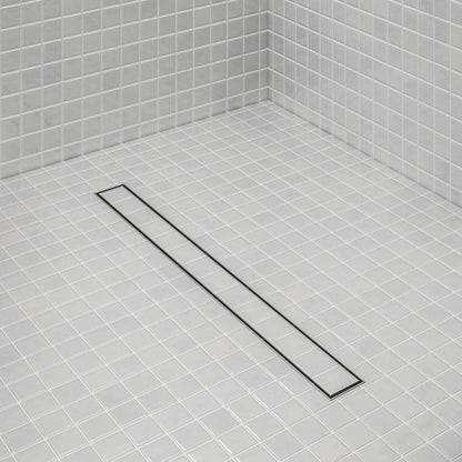 Bay 2-in-1 Linear Drain by QM Drain installed in a contemporary shower. Reversible grate shown in use, blending seamlessly with large-format tiles for efficient drainage and minimalist design.