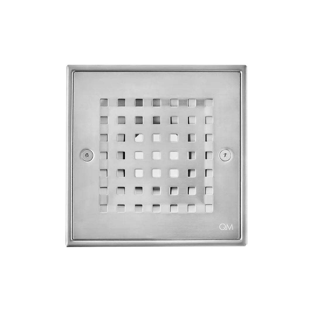Bay Square 5" x 3¼" Center Drain by QM Drain. Compact stainless steel floor drain with square grate and center outlet, ideal for smaller shower spaces or custom installations.