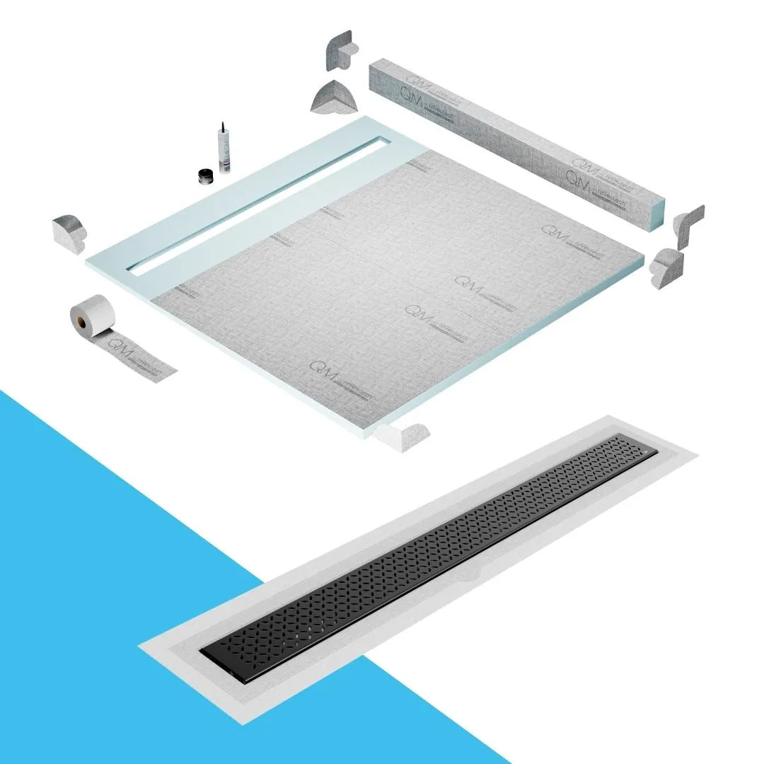 QM Drain Curb Shower Pan with Delmar Lotus Flange Edge Linear Drain, stainless-steel decorative floral grate design, integrated flange for seamless tile installation, efficient drainage, offered in Satin, Gold, Bronze, Polished, and Black finishes.