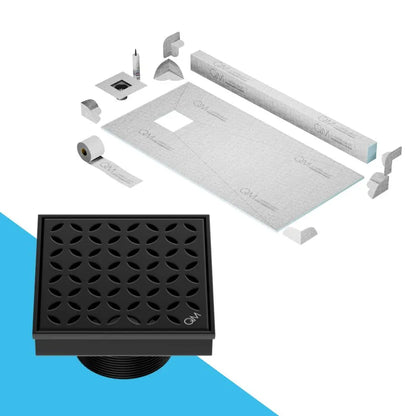 QM Drain curb Shower Pan with Delmar Lotus Off-Center Square Drain, elegant floral-pattern stainless-steel grate, stylish, efficient drainage, offered in Satin, Gold, Bronze, Polished, and Black finishes.