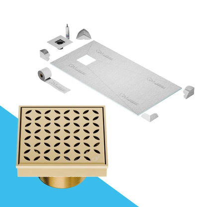 QM Drain Curbless Shower Pan with Delmar Lotus Off Center Square Drain, stainless-steel floral-pattern grate, available in Satin, Gold, Bronze, Polished, and Black finishes, offering elegant aesthetics and effective water drainage for luxury bathrooms.