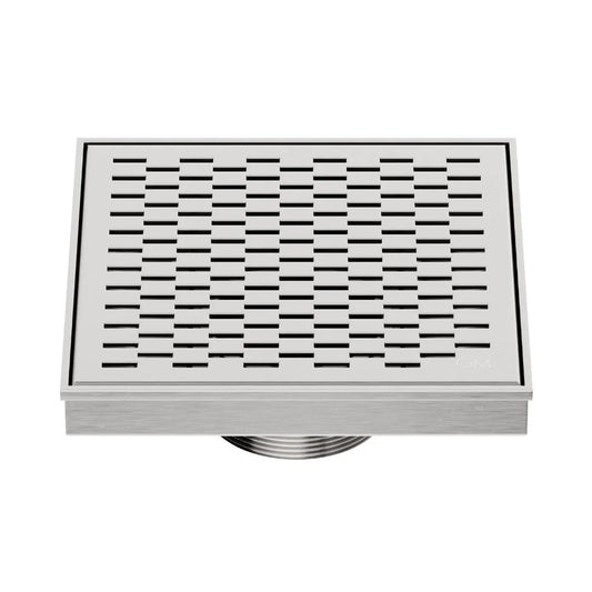 QM Drain Delmar Delta Square Drain 5 3/4-inch in Satin finish, featuring a sleek stainless-steel square-pattern grate. This drain ensures efficient water drainage, seamless tile integration, and a high-end polished aesthetic, perfect for luxury shower and bathroom floor installations.