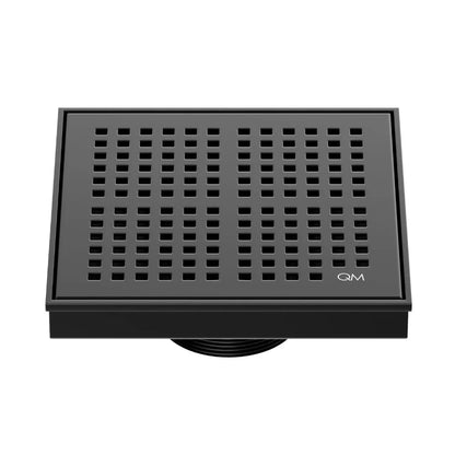 QM Drain Delmar Kai Square Drain 5 3/4-inch in Black finish, featuring a sleek stainless-steel grate with fine square perforations. This drain offers efficient water drainage, seamless tile integration, and a modern, minimalist design, perfect for luxury shower and bathroom floor installations.