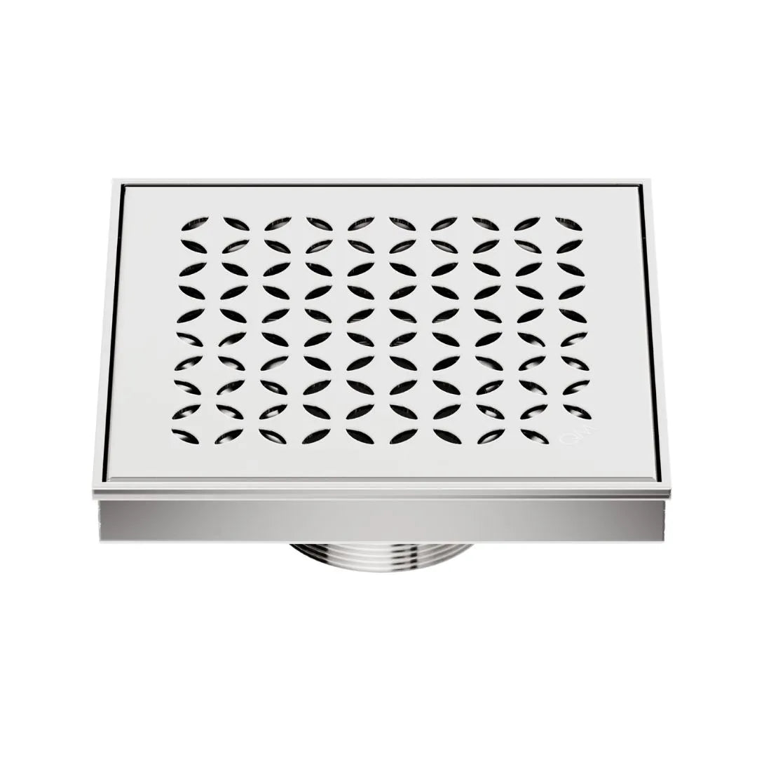 QM Drain Delmar Lotus Square Drain 5 3/4-inch in Polished finish, featuring a sleek stainless-steel channel with an elegant floral-pattern grate. This drain ensures efficient water drainage, seamless tile integration, and a modern minimalist aesthetic, perfect for luxury shower and bathroom floor installations.
