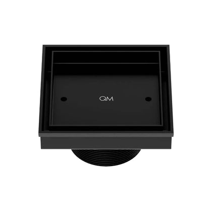 QM Drain Delmar Mist Tile-In Square Shower Drain 4x4-inch in Black finish, featuring a sleek stainless-steel channel with a 'mist' perforated grate design. This drain allows seamless tile integration, offering efficient water drainage and a modern aesthetic for luxury shower and bathroom floor installations.