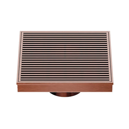 QM Drain Delmar Wedgewire Square Drain 5 3/4-inch in Bronze finish, featuring a stainless-steel channel with a precision wedge-wire grate design. This drain ensures efficient water drainage, seamless tile integration, and an elegant aesthetic, ideal for luxury shower and bathroom floor installations.
