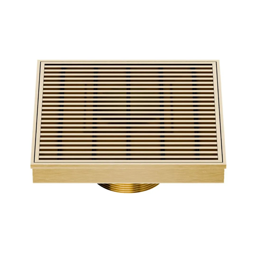 QM Drain Delmar Wedgewire Square Drain 5 3/4-inch in Gold finish, featuring a stainless-steel channel with a precision wedge-wire grate design. This drain offers efficient water drainage, seamless tile integration, and a luxurious aesthetic, ideal for high-end shower and bathroom floor installations.