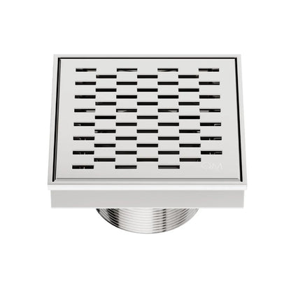 QM Drain Delmar Delta Square Drain in Polished finish, featuring a sleek stainless-steel square-pattern grate. This drain ensures efficient water drainage and seamless tile integration, offering a sophisticated and modern aesthetic for luxury shower and bathroom floor installations