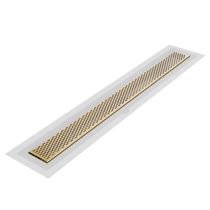QM Drain Delta Delmar Standard Length Flange Edge Linear Drain in Gold finish, featuring a sleek stainless-steel channel with a modern flange edge design. This drain offers efficient water drainage, seamless tile integration, and a luxurious aesthetic, ideal for high-end shower and bathroom floor installations.