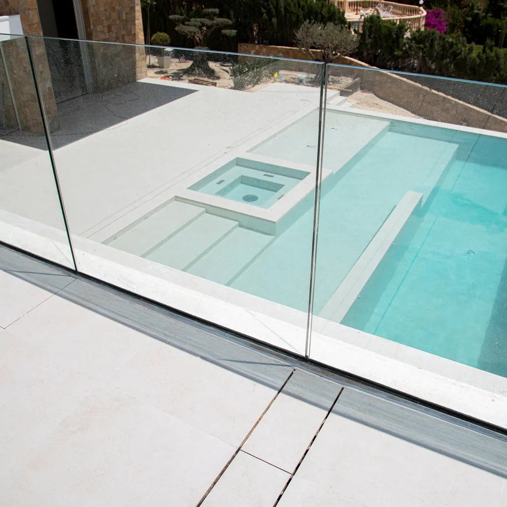 QM Drain Invisible Modular Linear Drain System installed in a deck, providing seamless integration for efficient water drainage. This system is designed for modern outdoor spaces, offering a sleek and minimalist aesthetic while ensuring optimal performance in luxury poolside or patio installations.