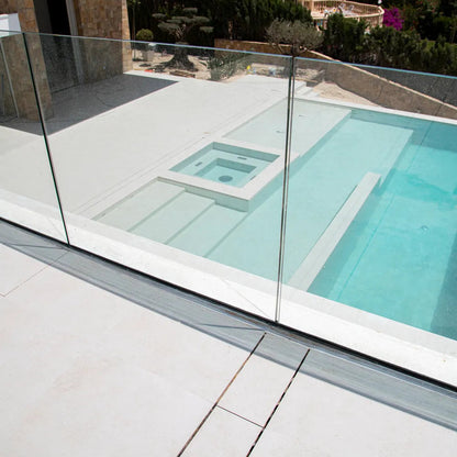 QM Drain Invisible Modular Linear Drain System installed in a deck, providing seamless integration for efficient water drainage. This system is designed for modern outdoor spaces, offering a sleek and minimalist aesthetic while ensuring optimal performance in luxury poolside or patio installations.