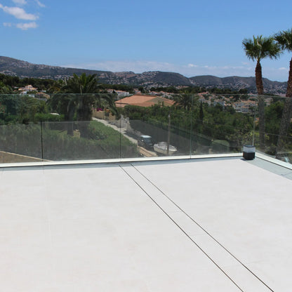 QM Drain Invisible Modular Linear Drain System installed in a deck, providing seamless integration for efficient water drainage. This system is designed for modern outdoor spaces, offering a sleek and minimalist aesthetic while ensuring optimal performance in luxury poolside or patio installations.