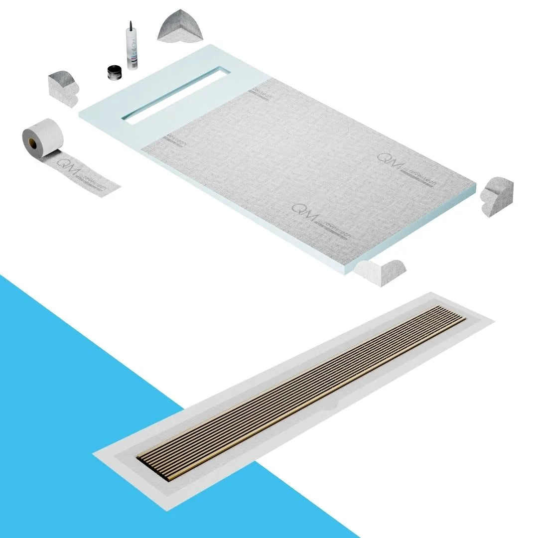 QM Drain Prefab Shower Pan Kit paired with Wedgewire Linear Drain Kit 32 in Gold Flange Edge finish. This high-quality system features a sleek wedgewire design, seamless tile integration, efficient water drainage, and a luxurious gold aesthetic, perfect for modern luxury shower installations.