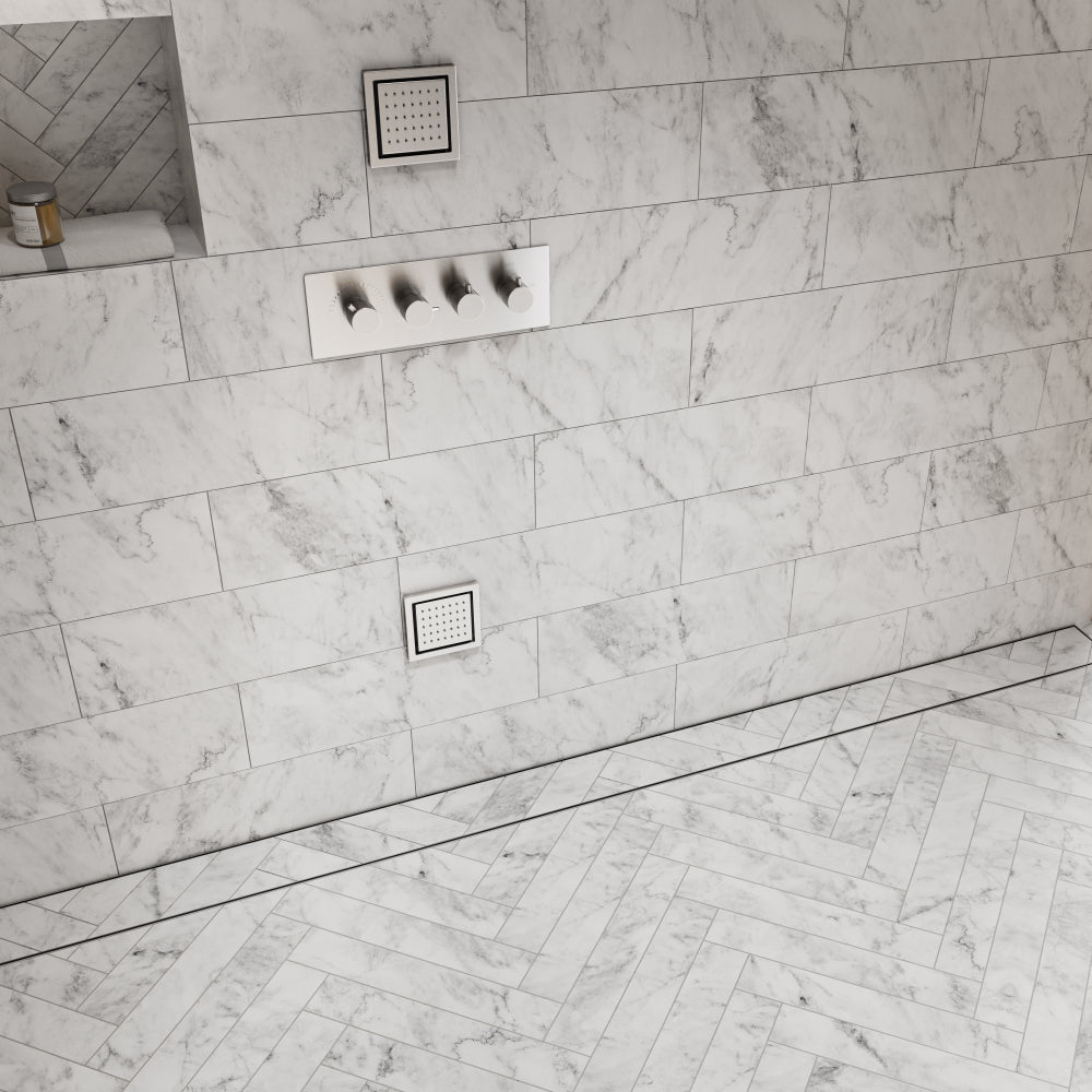 QM Drain product image showcasing the Mist Adjustable Linear Drain in Satin. This drain features a sleek satin finish, designed for seamless tile integration and efficient water drainage, making it an ideal choice for modern, high-end shower installations with a minimalist aesthetic.