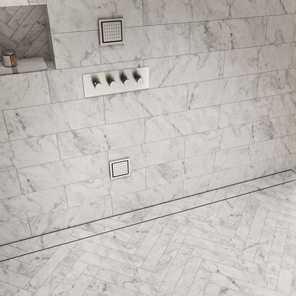 QM Drain product image showcasing the Mist Adjustable Linear Drain in Satin. This drain features a sleek satin finish, designed for seamless tile integration and efficient water drainage, making it an ideal choice for modern, high-end shower installations with a minimalist aesthetic.
