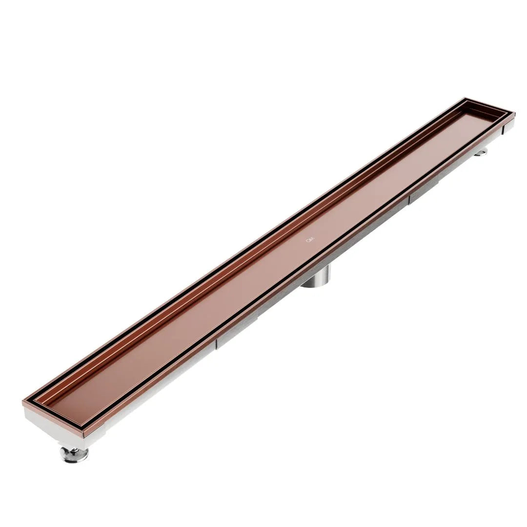QM Drain Mist Tile-In Adjustable Kit Delmar Linear Drain in Bronze finish with 2″ outlet, featuring a stainless-steel adjustable channel with precision perforated grate, integrated waterproof flange, and customizable length for efficient drainage and seamless integration into luxury shower installations.