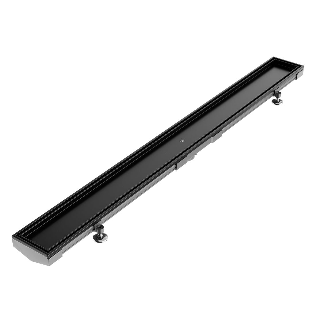 QM Drain Mist (Tile-In) Adjustable Lagos Linear Drain with 2-inch outlet in Black finish, featuring a stainless-steel channel with fine perforated 'mist' grate. This adjustable drain offers seamless tile integration, efficient water drainage, and a modern minimalist aesthetic for luxury shower installations.