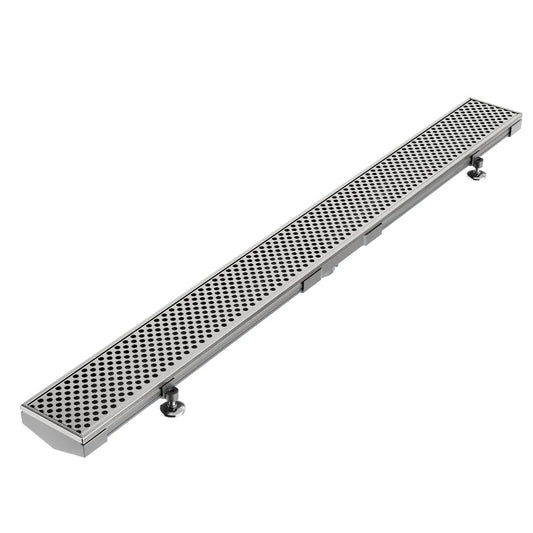 Modern shower floor showcasing the Perforated Adjustable Kit Lagos Linear Drain in Satin finish with 3″ outlet—stainless-steel adjustable channel with precision perforated grate, integrated waterproof flange beneath surrounding tiles, and versatile on-site frame for efficient customizable drainage.