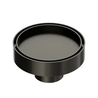 QM Drain Mist Couture Round Drain in Luxe Gray finish, available in 4”x 4” and 5 ¾”x 5 ¾” sizes. This elegant stainless-steel drain features a fine perforated circular grate, providing efficient water drainage while seamlessly integrating into modern luxury shower and bathroom installations.