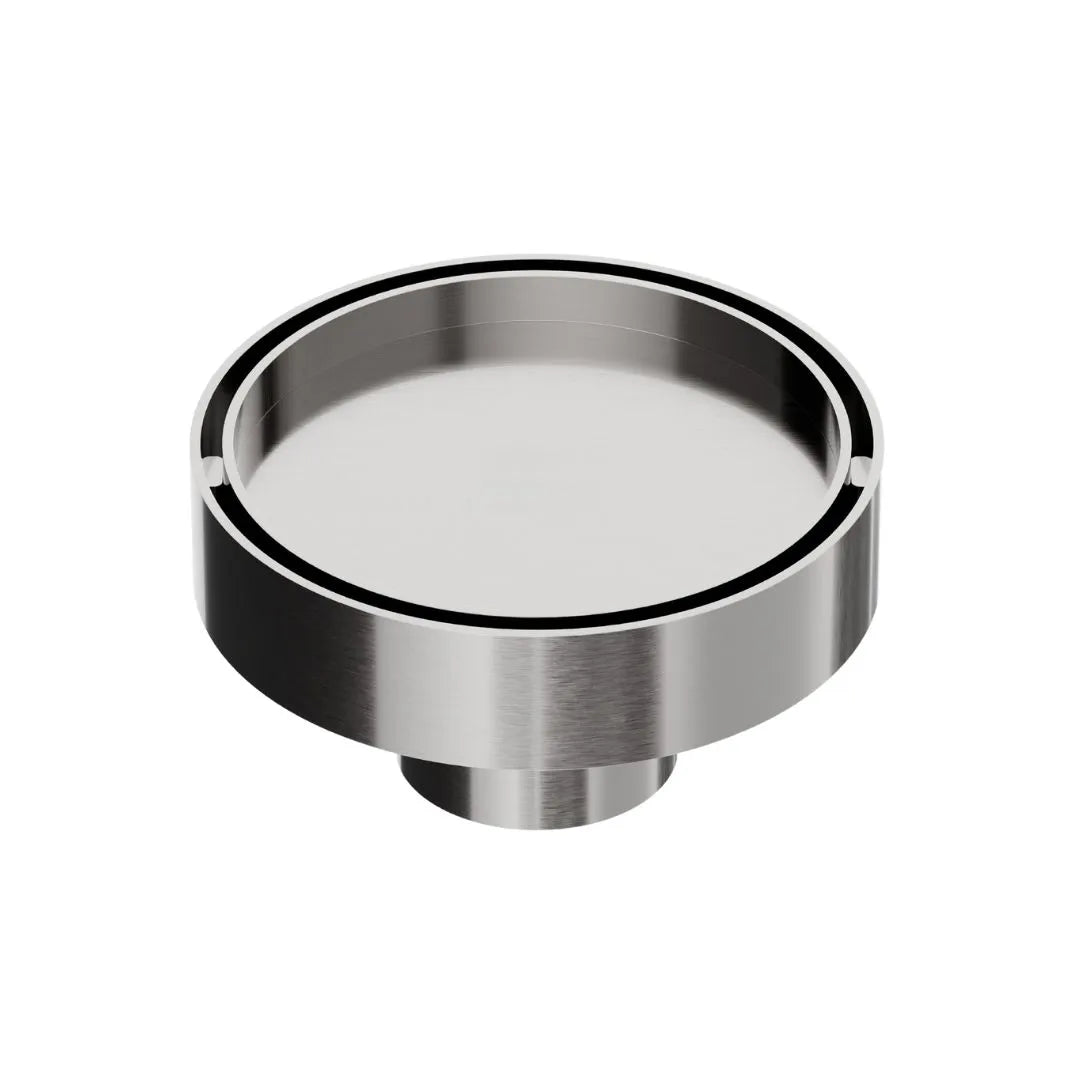 QM Drain Mist Couture Round Drain in Satin finish, available in 4”x 4” and 5 ¾”x 5 ¾” sizes. This elegant stainless-steel drain features a fine perforated circular grate, providing efficient water drainage while seamlessly integrating into modern luxury shower and bathroom installations.